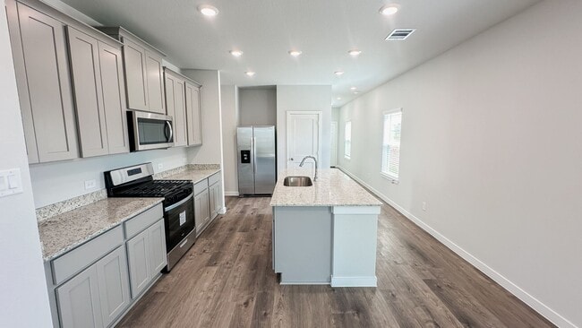 Building Photo - Brand new! Modern 3-Bedroom with Open-Conc...