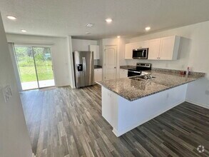Building Photo - Spacious 4-Bedroom Home with Primary Suite...