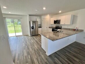 Building Photo - Spacious 4-Bedroom Home with Primary Suite...