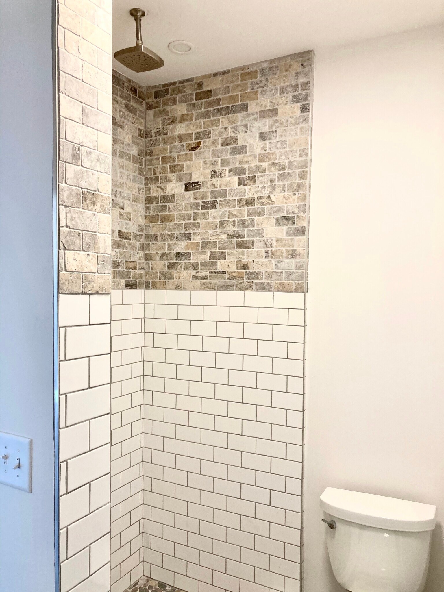 Ceramic Subway Tile and Granite tile in Primary Bedroom En Suite Bath - 1311 Blair St
