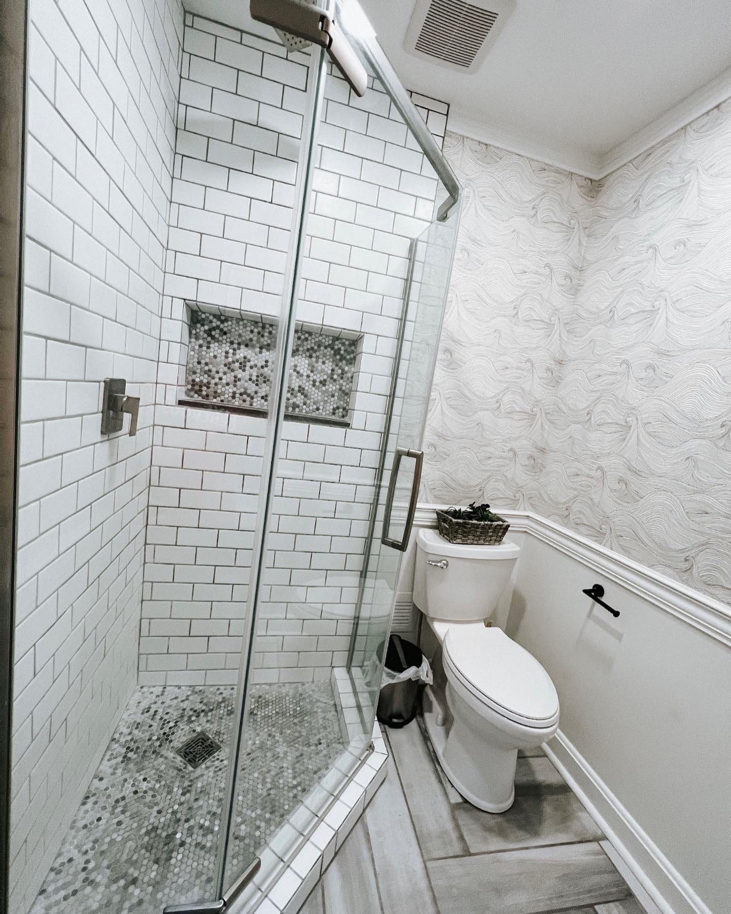 The bathroom on the main floor has a rainfall shower. - 624 Park St