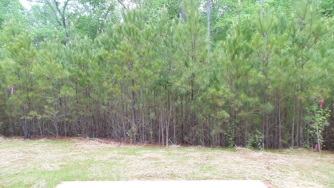 Building Photo - Home with Private Back Yard Available For ...