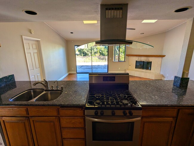 Kitchen open to family room - 3972 Ecochee Ave