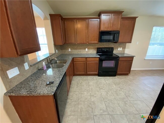 Building Photo - 5911 Hopkins Dr