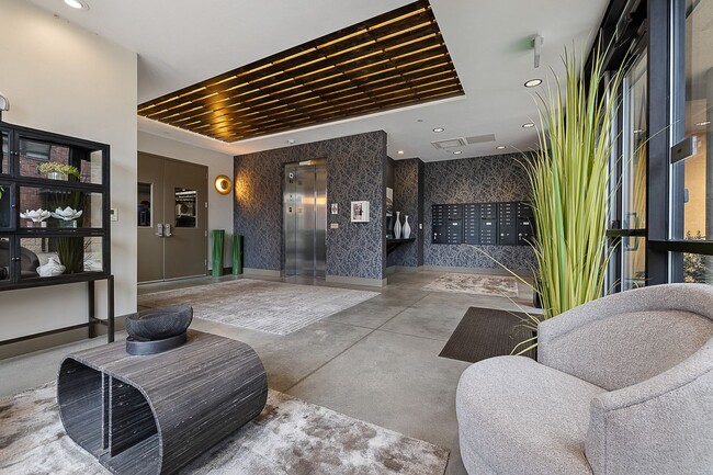 Building Photo - COME HOME TO REFINED DOWNTOWN LUXURY CONDO...