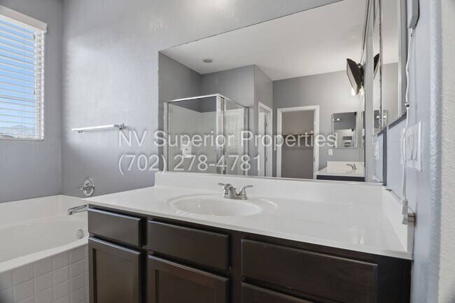 Building Photo - NW!! 4 Bedrooms!!! One Bedroom Down!!  Pool!!! Tankless Hot Water Heater!! Court yard at entrance...