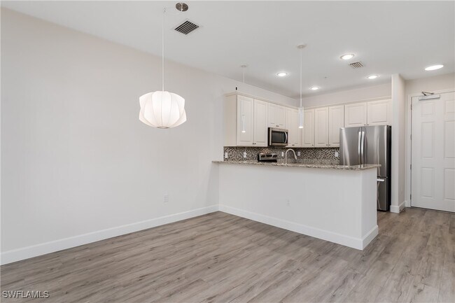 Building Photo - 9072 Covina Dr N