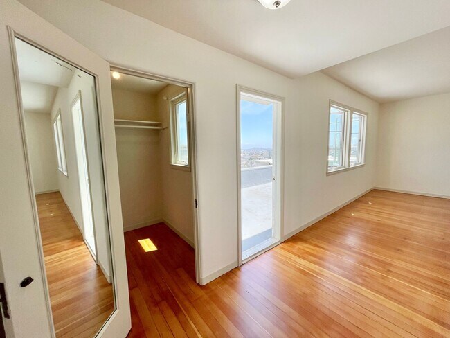 Building Photo - Bright and Airy 2 Bedroom Penthouse in the...