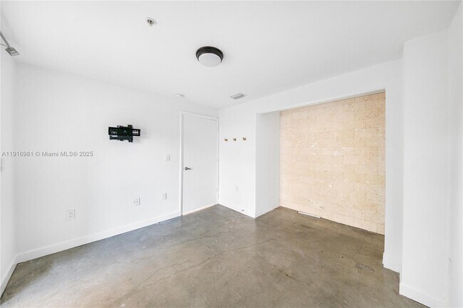 Building Photo - 7700 Collins Ave