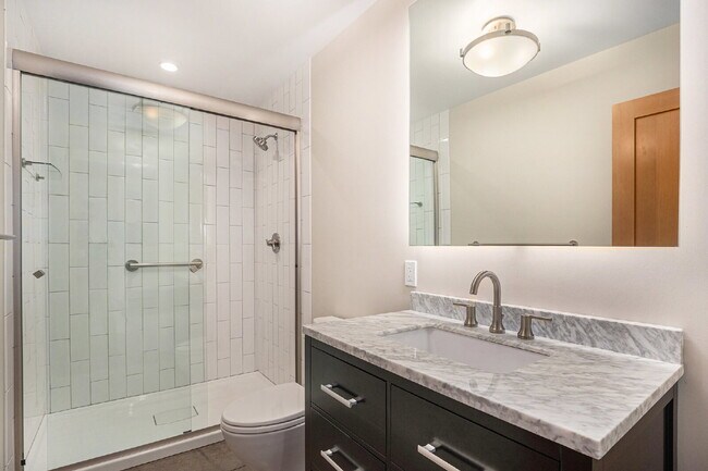 Building Photo - "Modern 4-Bed Boulder Retreat with Granite Elegance & Finished Basement!"