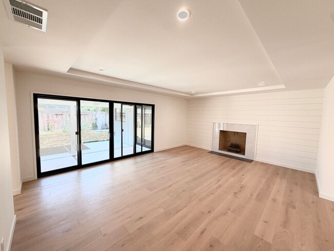 Building Photo - This premier 4-bed, 3-bath estate spans 2,565 sq. ft. on a 10,253 sq. ft. lot in North Los Altos.