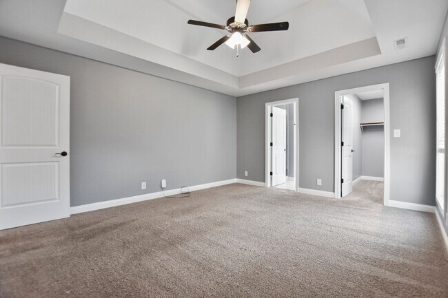 Building Photo - Pet Friendly Three Bedroom with Bonus!