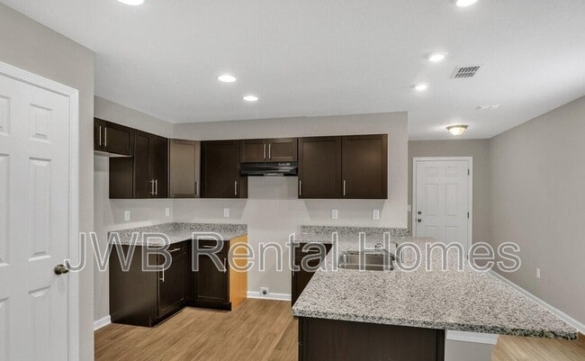 Building Photo - 7609 Eaton Ave
