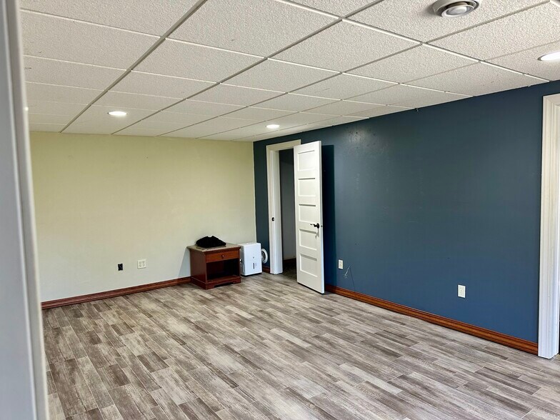 Lower living room or third bedroom - 7166 Sundew Rd