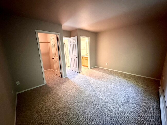 Building Photo - Introducing the Perfect Townhouse Steps Away from Central WA University!