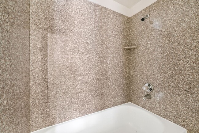 Building Photo - Guard-Gated Condo Living with Resort-Style Community Amenities!