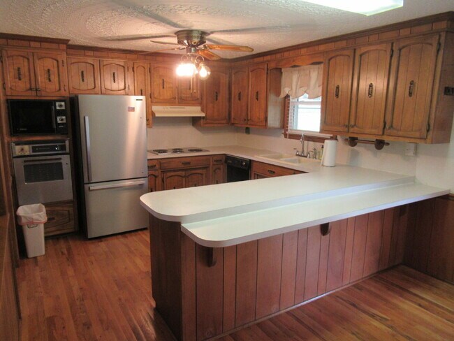 Building Photo - Charming All-Brick Ranch with Finished Bas...