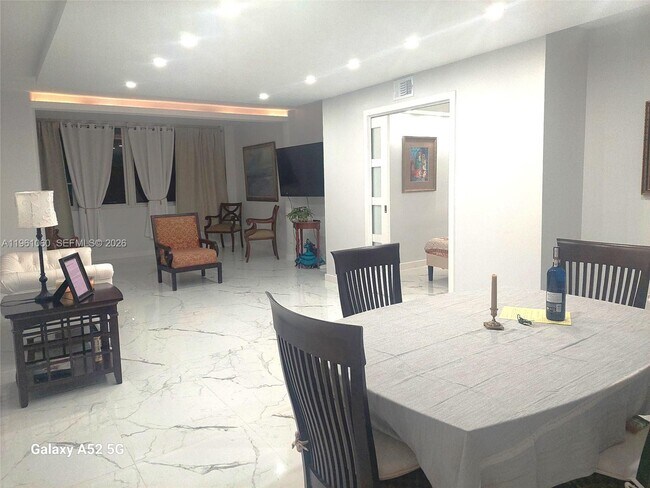 Building Photo - 5005 Collins Ave