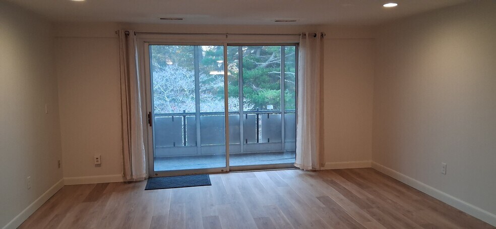 8 ft slider to balcony. Grills not allowed. - 201 Hoffman Ave