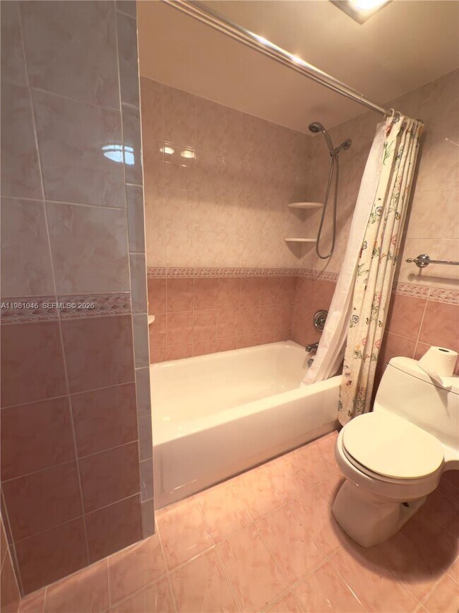 Building Photo - 3675 N Country Club Dr