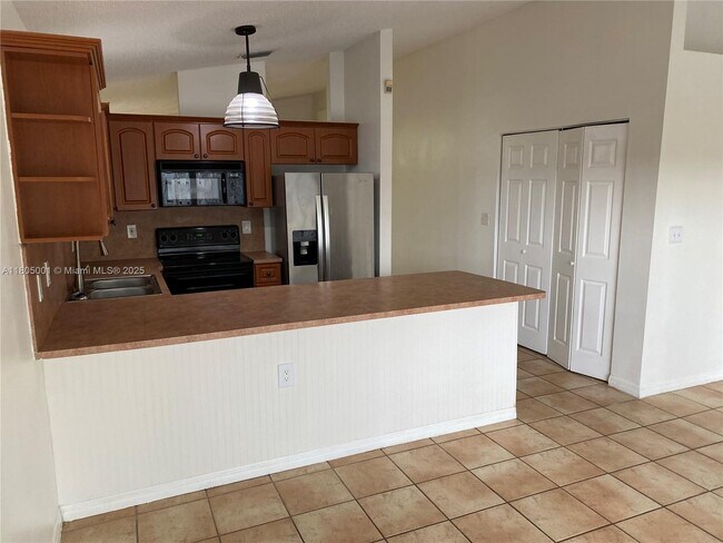 Building Photo - 7601 NW 166th Terrace