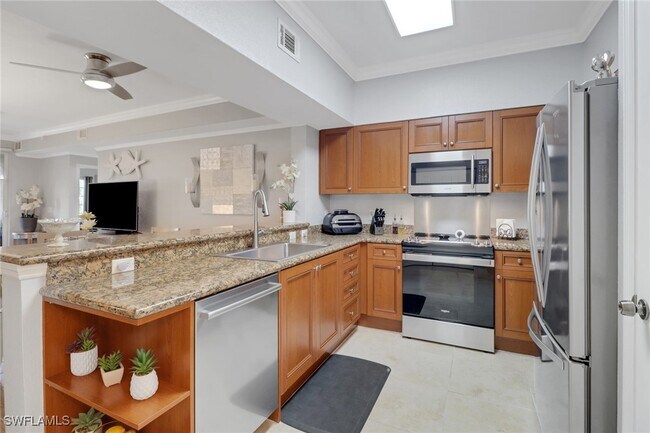 Building Photo - 10126 Villagio Palms Way