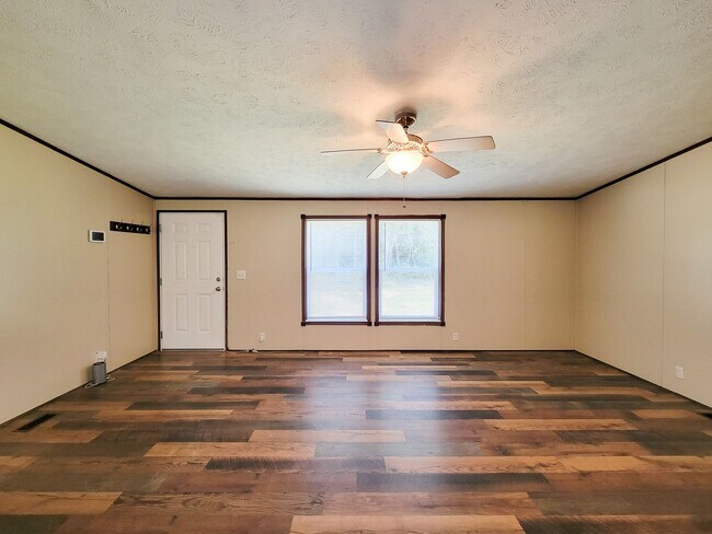 Building Photo - Cozy and Adorable home 4 bedroom 2 bath home on over 1 acre near McRae Lake! Relax on the covered...