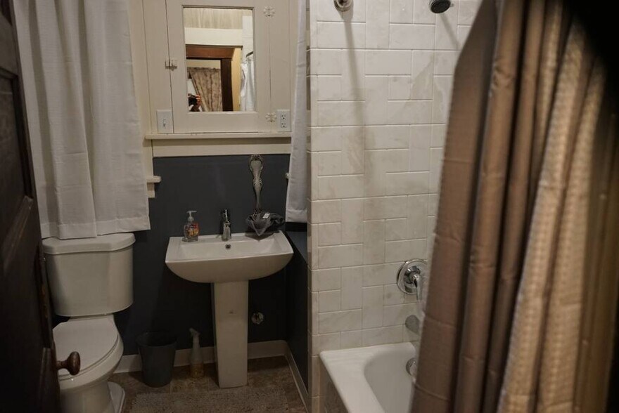 Full-size shower and tub - 4910 E 6th Ave