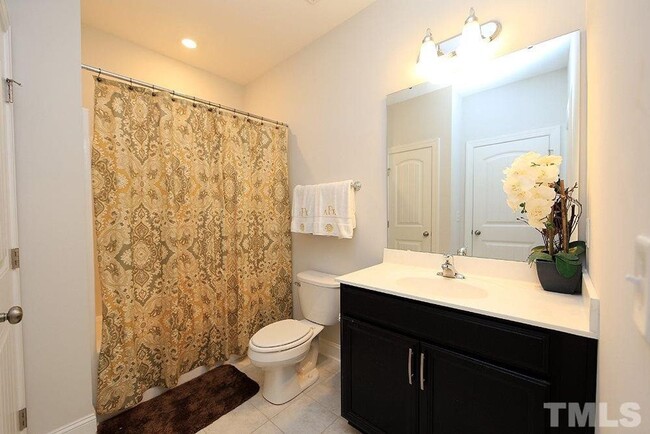 Building Photo - Main Floor Owner's Suite PLUS Main Floor G...