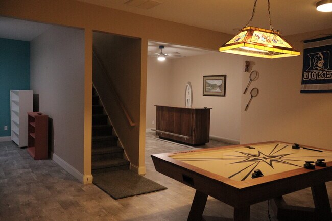 Building Photo - Expansive Mostly-Furnished Residence featuring 3 Bedrooms, a Completed Basement, and a Loft Space