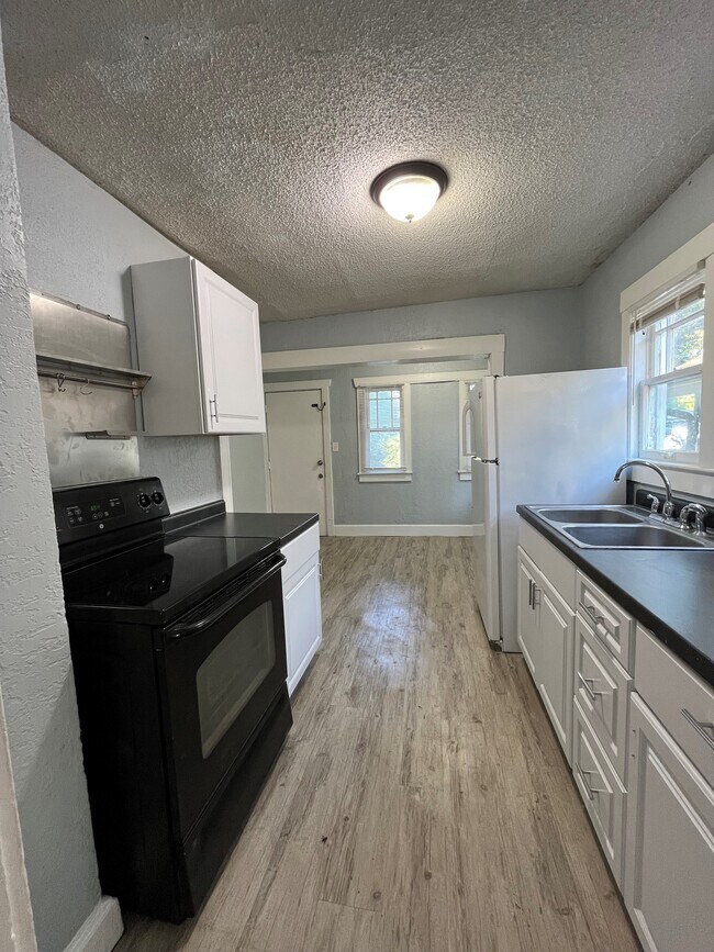 New Cabinets and Counter Tops, Fridge and Stove Stay - 2913 N 27th St