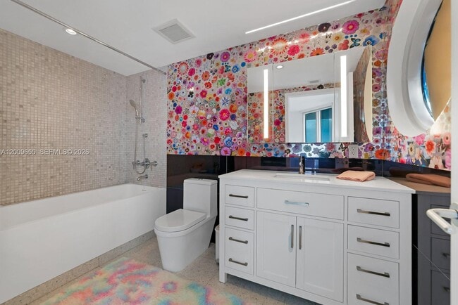 Building Photo - 5801 Collins Ave