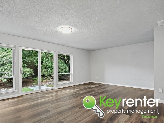 Building Photo - Updated 4-Bedroom, 2-Bath Tacoma Home for Rent Near Tacoma Community College and 6th Ave!