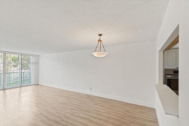 Building Photo - 19380 Collins Ave