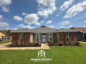 Building Photo - Charming 3BR/2BA Near Southwind | High Vaulted Ceilings, Hardwood Floors & Fireplace