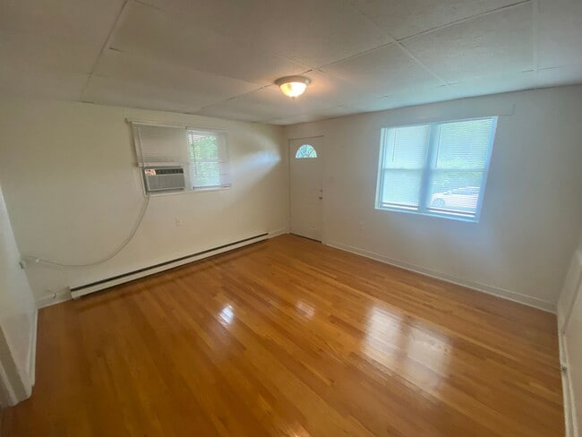 Building Photo - Private carport, in-unit laundry, and the Lakewood strip right outside your door.
