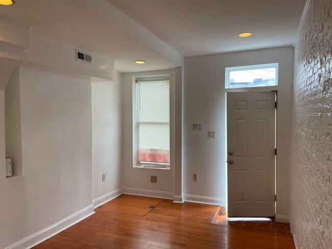 Building Photo - Charming 2-Bedroom, 1.5-Bathroom Brick Townhouse in Pigtown