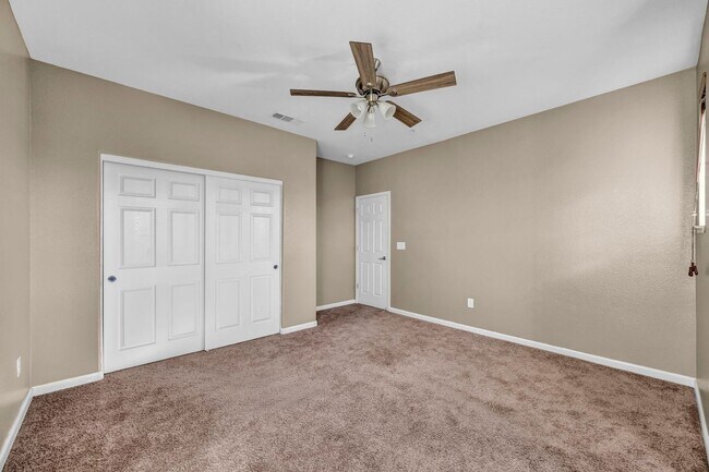 Building Photo - Sun-Filled, Spacious Living with a Three-Car Garage