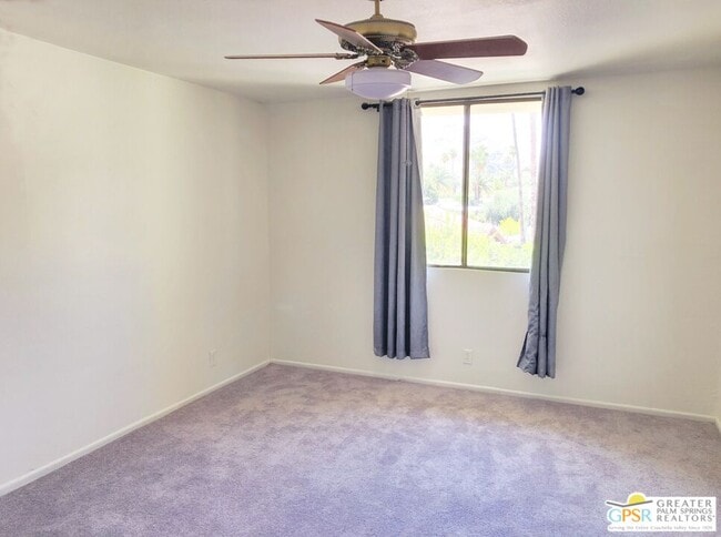 Building Photo - 1655 E Palm Canyon Dr