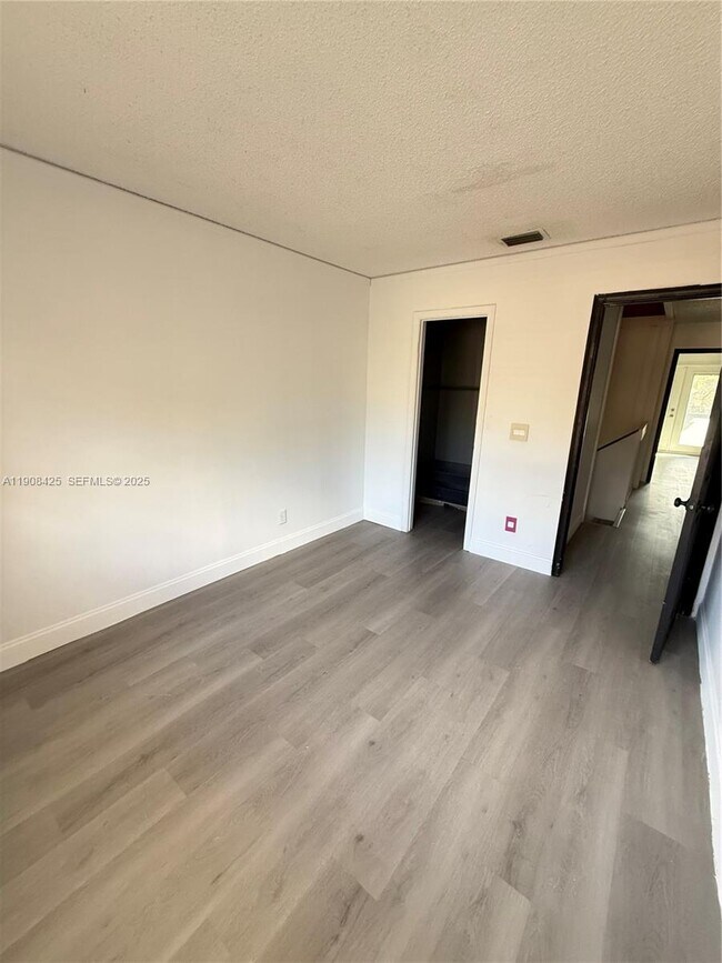 Building Photo - 9986 Royal Palm Blvd