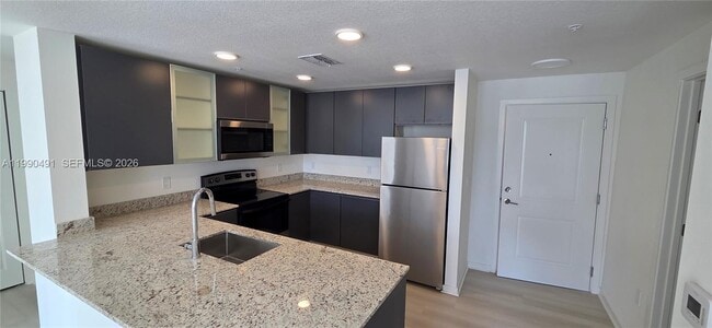 Building Photo - 5579 Millennia Park Dr