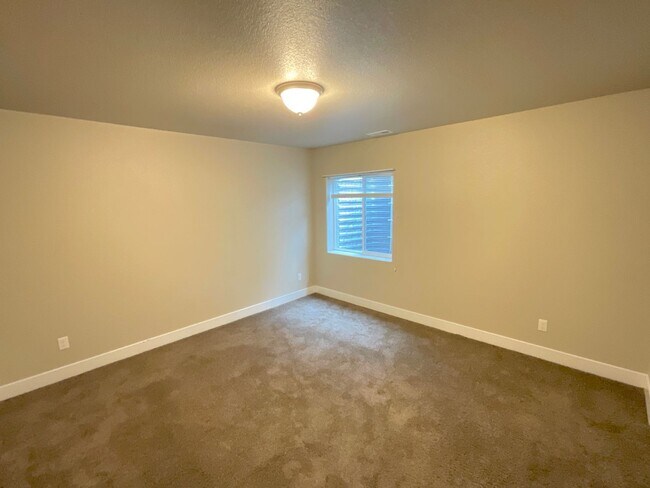 Building Photo - 4 Bedroom Home Available Near Woodmoor Dr ...