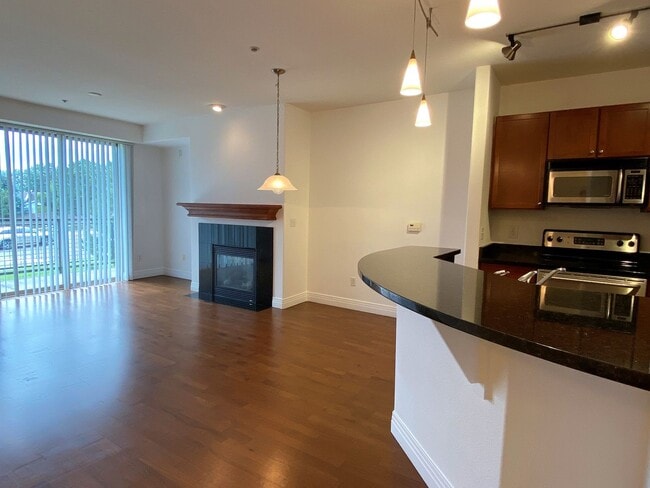 Building Photo - Stylish 1BD/1BA Condo with Garage & Balcony in Sought-After Englewood Location | $1,795/mo