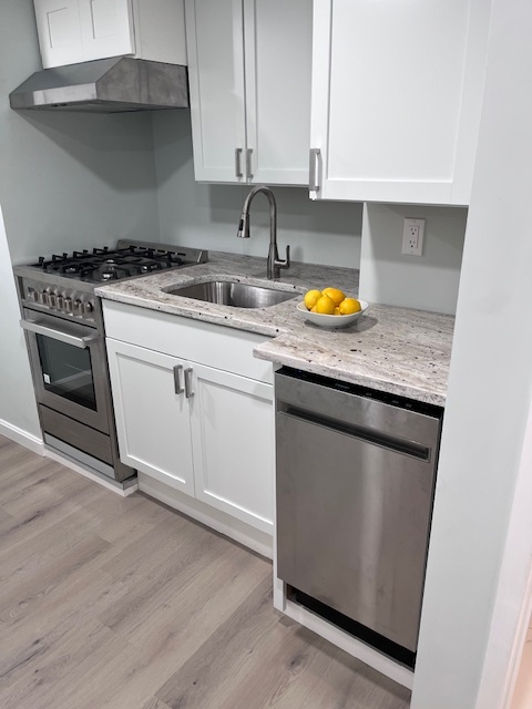 Completely renovated kitchen with countertop on beautiful natural stone. - 2 Central St