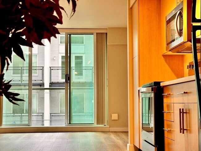 Building Photo - Downtown Bellevue Studio with Balcony, In-...