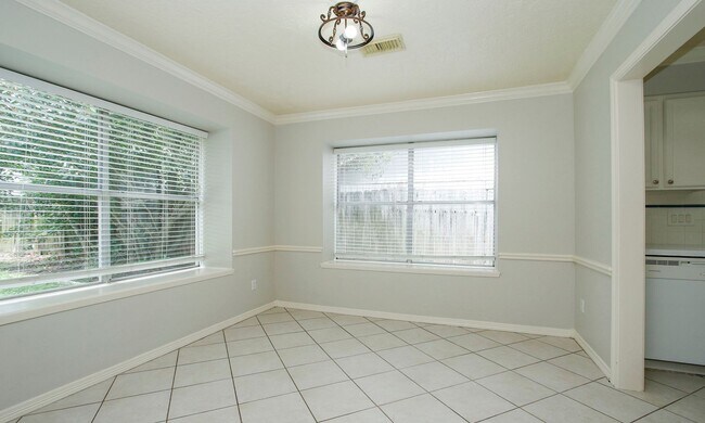 Building Photo - 4 Bedroom 2 Bathroom Cypress Home with Fireplace and Fenced Backyard