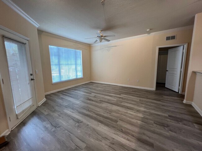 Building Photo - Gardens of Bridgehampton is a luxury condo...