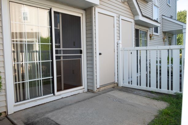Patio with storage closet - 404 Oswego Ct
