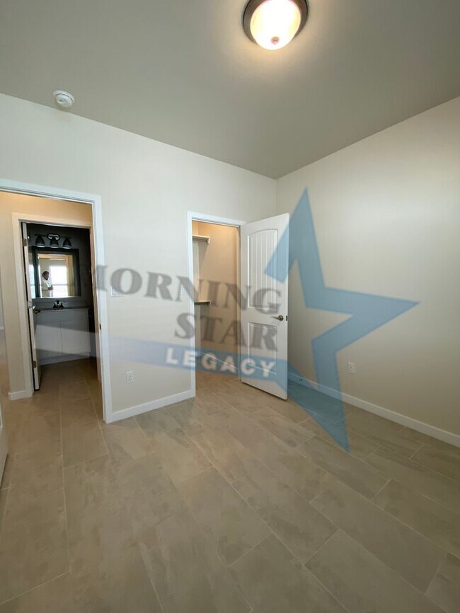 Building Photo - NEW CONSTRUCTION AND FULLY LOADED