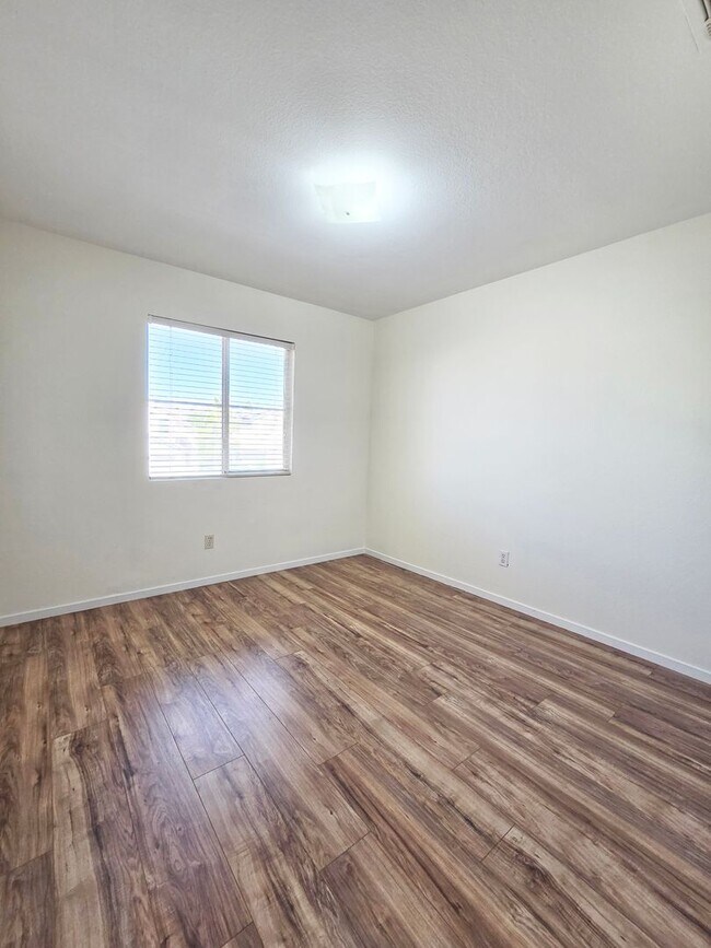 Building Photo - Spacious 4-Bedroom Corner Lot Home with Covered Patio